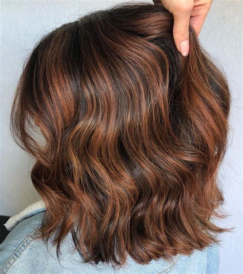If your hair texture is fine, it will make it appear thicker and will add more volume. . Brown hair with auburn highlights